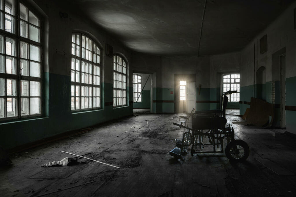 Inside old Orlovka Asylum for the insane in Voronezh Region. Dark creepy abandoned mental hospital.