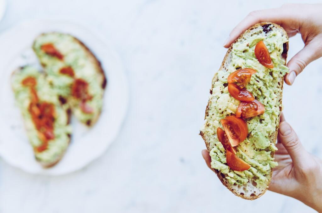 avocado toast, flatlay, hand