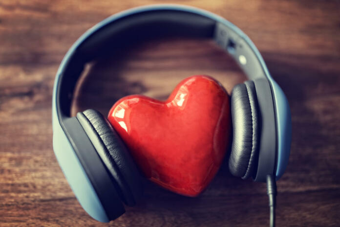 Headphones and heart concept for love listening to music