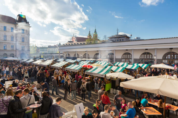 Ljubljana, Slovenia - April 10: People enjoing outdoor street food festival of Pivo and burger, Beer and Burger event, on April 10th, 2016 in Ljubljana, Slovenia.