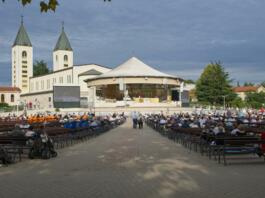 Medugorje, Bosnia and Herzegovina - Sep 20, 2023: Site of Catholic pilgrimage due to Our Lady of Medjugorje. Apparitions of the Virgin Mary mother of Jesus. Sunny summer day. Selective focus