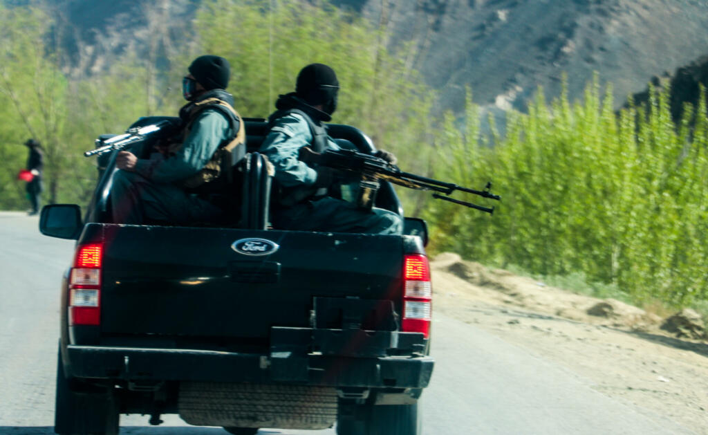 Old armoured vehicles military escorts, guns and tanks in Gardez in Afghanistan