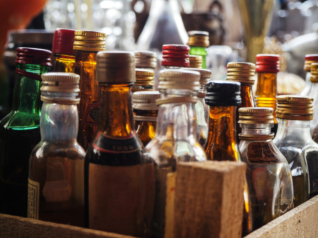 Old small glass drink bottles sold in antique market. Ankara - Turkey
