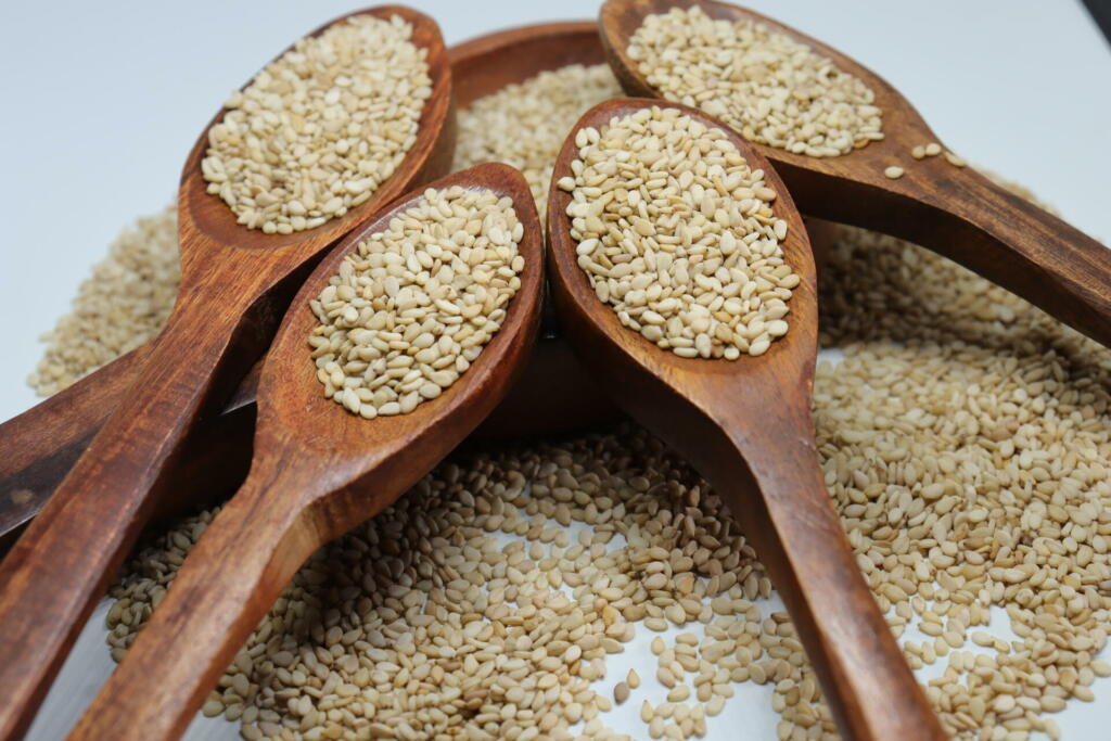 Organic natural Til Gul OR Sesame seeds over white background