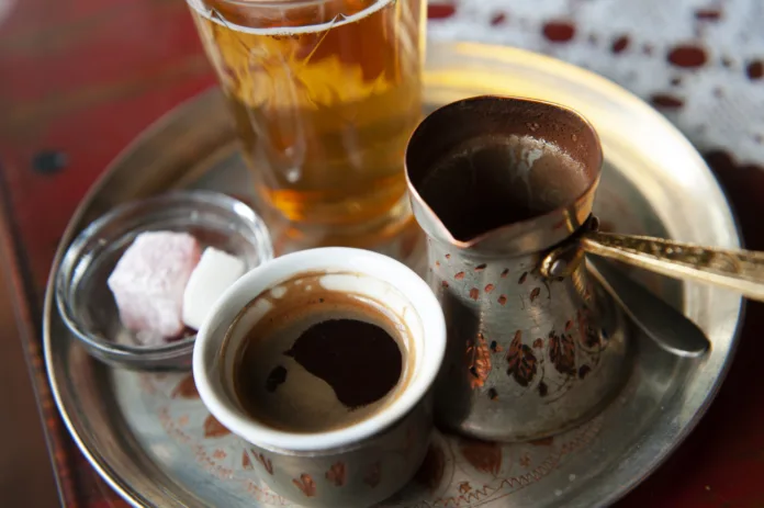 traditional-bosnian-coffee-served-from-a-copper-pot-with-local-sweets-sarajevo-bosnia-and-herzegovina-stockpack-istock Traditional Bosnian Coffee served from a copper pot with local sweets. Sarajevo, Bosnia and Herzegovina