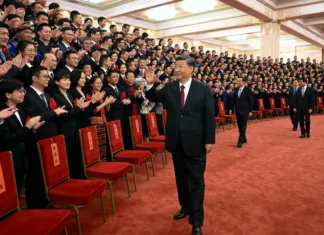 Kako je Xi Jinping postal simbol kitajske oblasti? Fotografija Xi Jinpinga na proslavi ob podelitvi nagrad uglednim kitajskim državljanom.