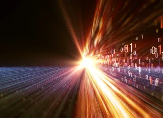 Padel je nov rekord prenosa podatkov, v pomoč bo dvigajočim cenam interneta 3D illustration. Color bytes of binary code flying through a vortex, background code depth of field and flares. Data transmission channel. Motion of digital data flow. Transferring of big data