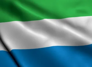 Evropski parlament Slovenijo zamešal s Sierra Leone, kakšne so lahko posledice? Sierra Leone Flag. Waving Fabric Satin Texture Flag of Sierra Leone 3D illustration. Real Texture Flag of the Republic of Sierra Leone