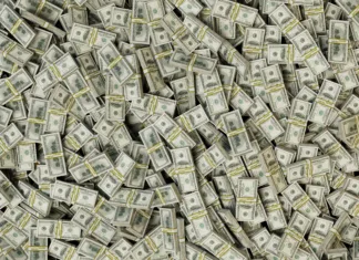 Koliko denarja je na svetu? Številka je nepredstavljiva abstract background consisting of packs of paper dollars. 3d render.