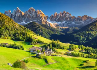 Kam na zadnje poletne avanture v naši bližini? Famous best alpine place of the world, Santa Maddalena village with magical Dolomites mountains in background, Val di Funes valley, Trentino Alto Adige region, Italy, Europe
