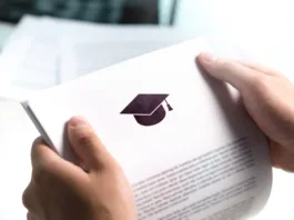 College or university application or letter from school. Student or teacher reading education document. Young man holding grant, graduation, study loan or scholarship paper.