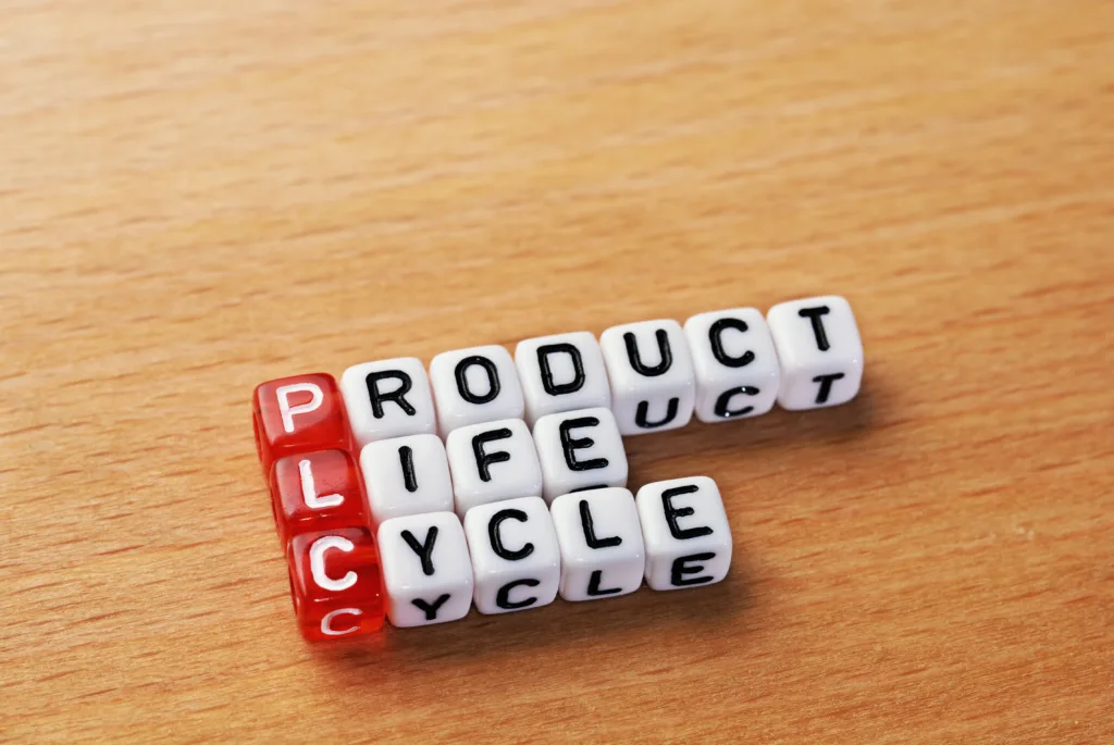 cubes with text PLC ,Product Life Cycle