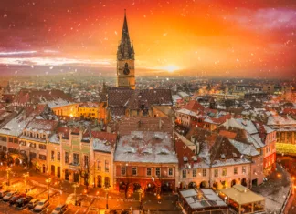 10 podcenjenih destinacij v Evropi Winter atmosphere in Sibiu, Romania. Discover a winter wonderland of snow-covered medieval architecture, twinkling lights, and festive charm in this historic Transylvanian city.
