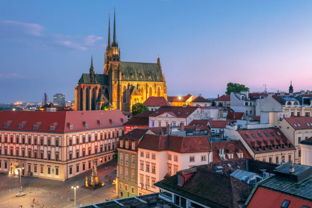 Aerial cityscape image of Brno, second largest city in Czech Republic with the Cathedral of St. Peter and Paul at summer sunset.