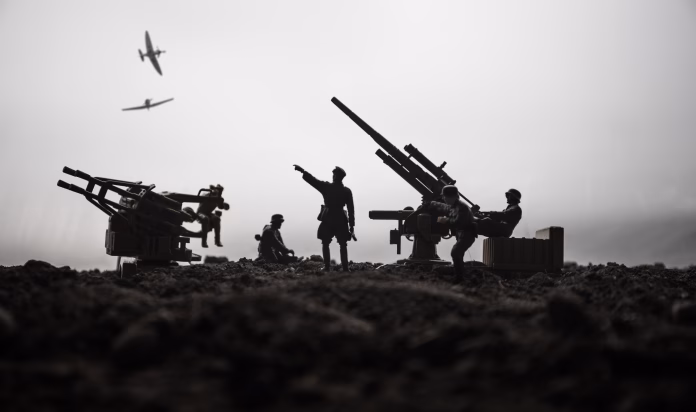 An anti-aircraft cannon and Military silhouettes fighting scene on war fog sky background. Allied air forces attacking on German positions. Artwork decorated scene. Selective focus