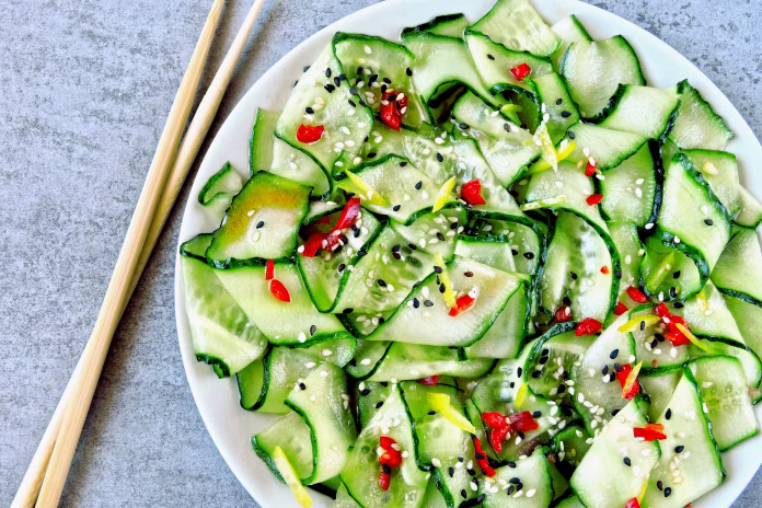 cucumber-salad-in-chinese-style-salad-with-cucumbers-and-chili-pepper-chinese-salad-with-cucumber-stockpack-istock Cucumber salad in Chinese style. Salad with cucumbers and chili pepper. Chinese salad with cucumber.