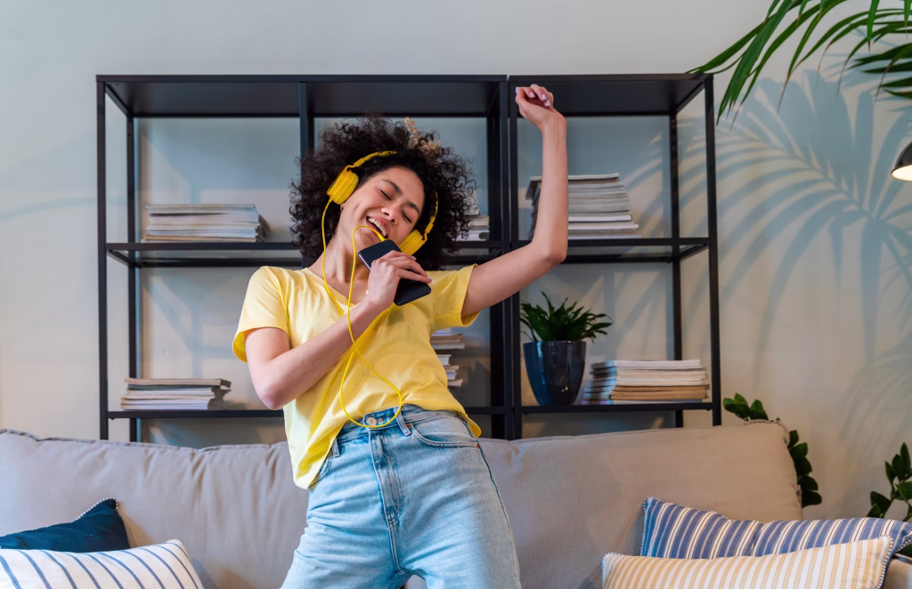 Beautiful latino young woman at home - Pretty south american with curly hair female portrait, lifestyle and domestic life scene