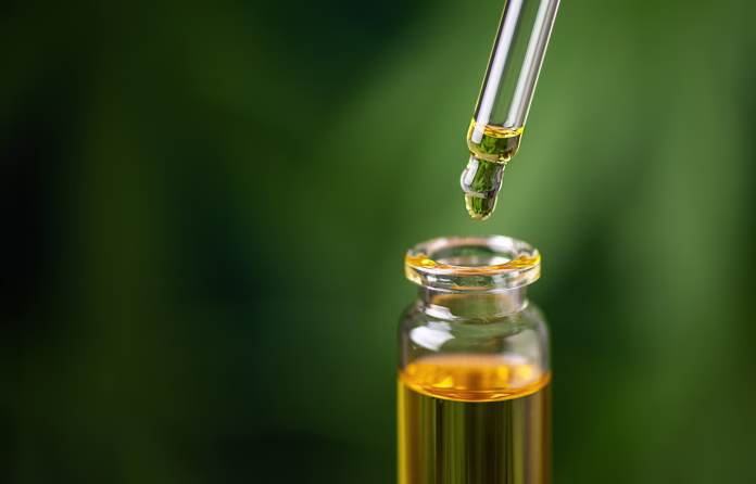 cbd-hemp-oil-on-cannabis-leaf-background-cbd-oil-extract-medical-cannabis-sativa-extraction-biomedical-and-hemp-herbal-medicine-stockpack-istock CBD hemp oil on cannabis leaf background. CBD oil extract. Medical cannabis sativa extraction. Biomedical and hemp herbal medicine.
