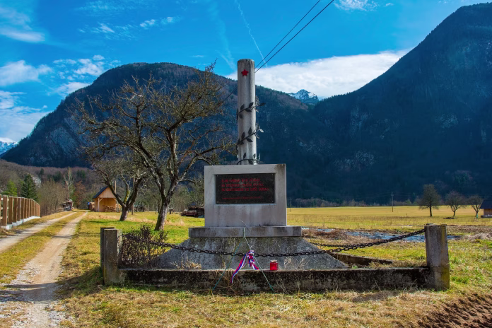 koritnica-slovenia-february-17th-2024-a-world-war-two-memorial-in-koritnica-in-the-bovec-municipality-of-primorska-or-slovene-littoral-region-north-west-slovenia-stockpack-istock Koritnica, Slovenia - February 17th 2024. A world war two memorial in Koritnica in the Bovec municipality of Primorska or Slovene Littoral region, north west Slovenia