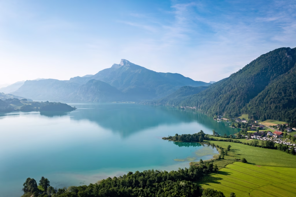 Lake Mondsee aerial view to Schafberg mountain. Idyllic Salzkammergut region during the summer.