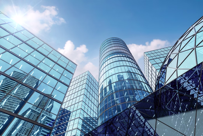 Modern style hi rise blue glass building exterior with sunny blue sky background 3d render for future business headquarter digital smart city concept