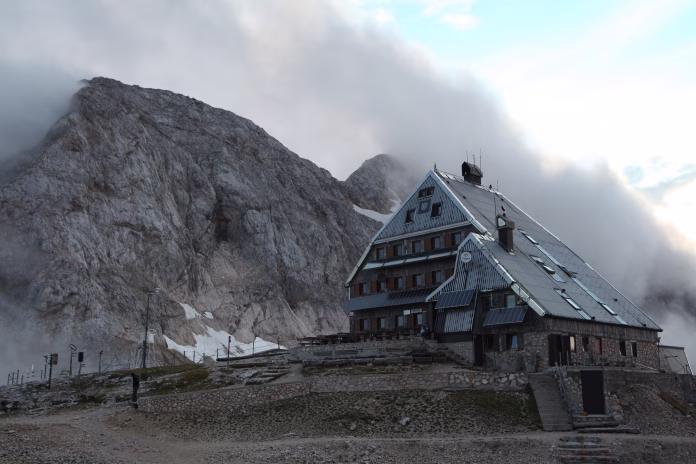 Mount Triglav, Slovenia - September 1, 2011: Triglavski Dom na Kredarici mountain hut (2,515 m) at the foot of Mount Triglav (2,864 m) in the Julian Alps, Slovenia.