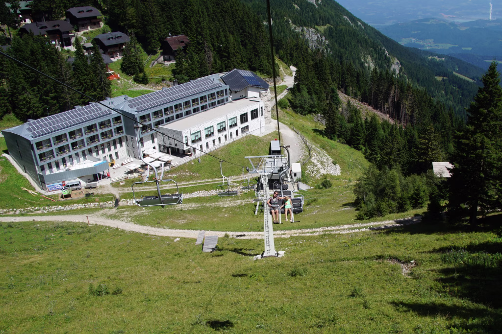 Mozirje, Slovenia - August 3, 2017: Unidentified tourist in a cableway in front of Moutain Hotel Golte in de Slovenian city of Mozirje, Europe.
