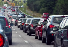 Pri Darsu razkrili, kdaj bo v juliju in avgustu na cestah daleč največ prometa Typical scene during rush hour. A traffic jam with rows of cars. Shallow depth of field.