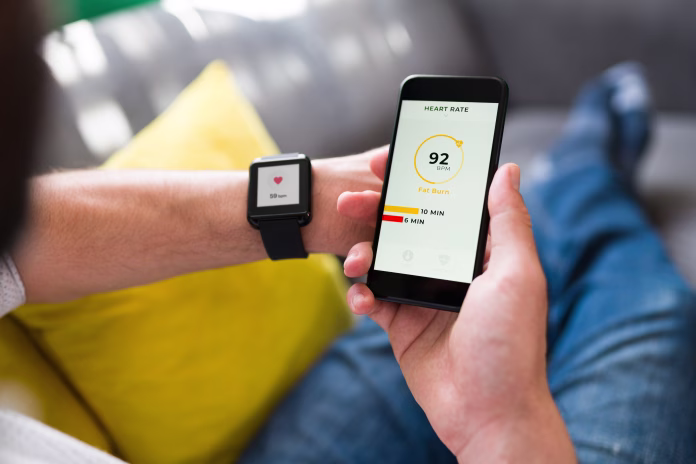 adult-person-connecting-a-fitness-app-with-his-smartphone-adult-man-checking-his-heart-rate-stockpack-istock Adult person connecting a fitness app with his smartphone. Adult man checking his heart rate