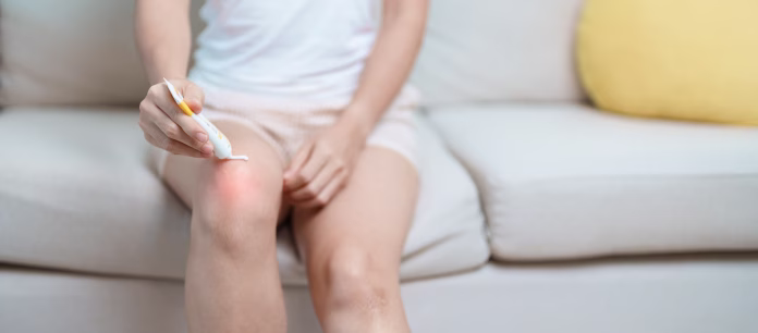 arthritis-and-muscle-pain-relief-cream-concept-woman-having-knee-ache-and-muscle-pain-due-to-runners-knee-or-patellofemoral-pain-syndrome-osteoarthritis-rheumatism-and-patellar-tendinitis-stockpack-istock Arthritis and Muscle Pain Relief Cream concept. woman having knee ache and muscle pain due to Runners Knee or Patellofemoral Pain Syndrome, osteoarthritis, rheumatism and Patellar Tendinitis