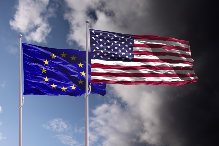 EU and USA flags above dark sky. Europe Union and United States of America trade and political confrontation