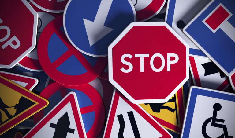 Front view of numerous french traffic road signs. Concept image for background