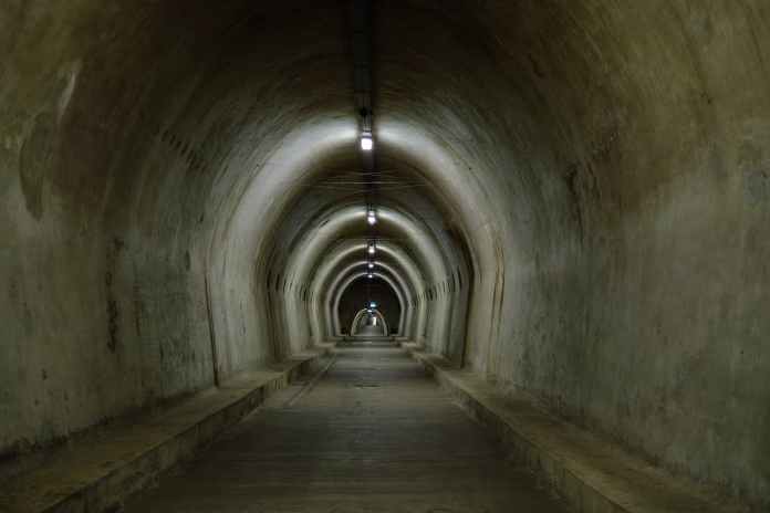 Grič Tunnel (Croatian: Tunel Grič) is a pedestrian tunnel located in the city centre of Zagreb, Croatia, under the historic neighbourhood of Grič (also called Gradec or Gornji Grad), which gave the tunnel its name. The tunnel consists of a central hall, which is connected by two passageways to Mesnička Street in the west and Stjepan Radić Street in the east, and four passageways extending to the south. It was built during World War II by the Ustaše government to serve both as a bomb shelter and a promenade, but following the war it quickly fell into disrepair and disuse. The tunnel saw renewed use only in the 1990s, hosting one of the first raves in Croatia, and functioning as a shelter during the Croatian War of Independence. In 2016, the tunnel was remodeled and opened to the public, serving as a tourist attraction and hosting cultural events. Planned expansions include a museum and a lift.