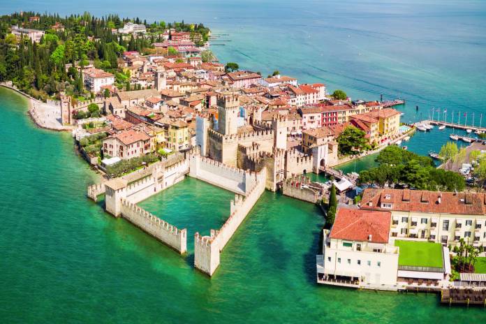 Scaligero Castle aerial panoramic view. Scaligero Castle is a fortress in the historical center of Sirmione town at the Garda Lake in Italy