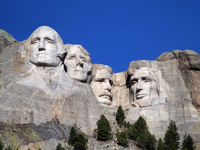 The iconic carving of famous presidents in american history.