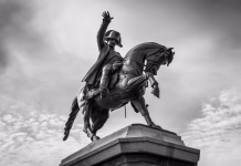 Na današnji dan umre Napoleon – Zakaj nas Napoleon še vedno fascinira? (Intervju z Mojco Zupan Vrtač) Cherbourg-Octeville, France - May 22, 2017: Napoleon statue on Horseback, the work of Armand Le Veel, located at Napoleon Square in Cherbourg-Octeville, France. Black and white photography.