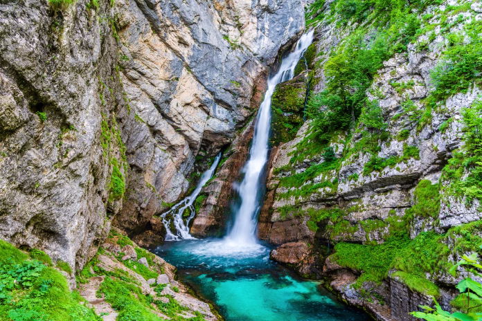 Falling water of beautiful Savica Waterfall in the Bohinj Lake area in the Triglav National Park, Julian Alps, Slovenia.