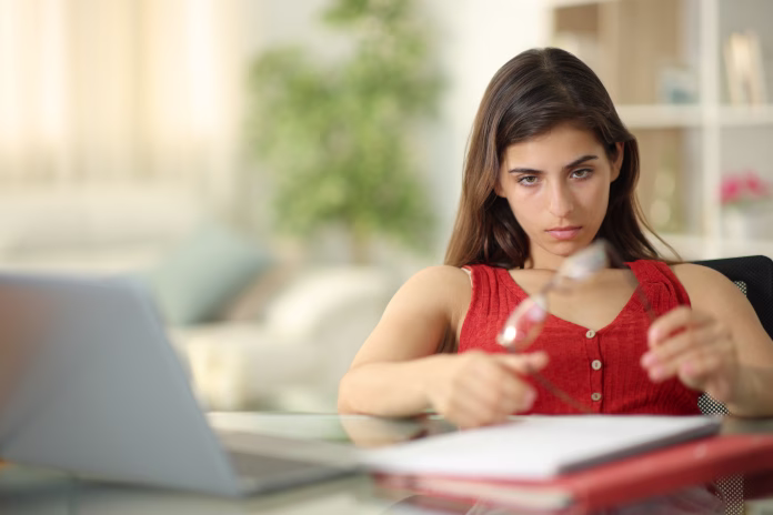 bored-student-distracting-playing-with-eyeglasses-stockpack-istock Bored student distracting playing with eyeglasses