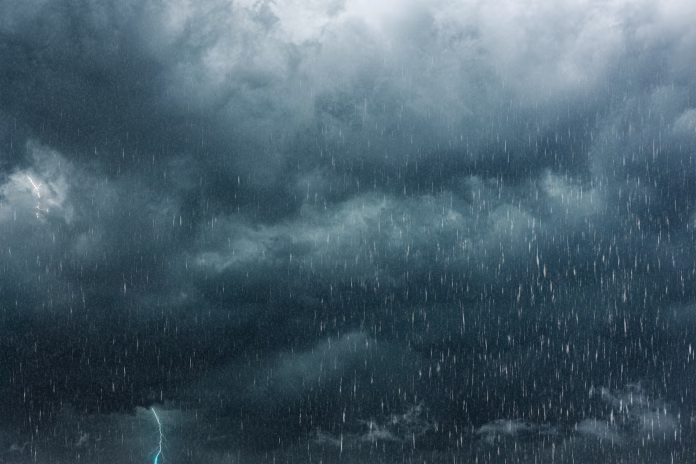 raining season. summer storm, dark sky cloudy heavy rain with thunder strike, weather in rainy season