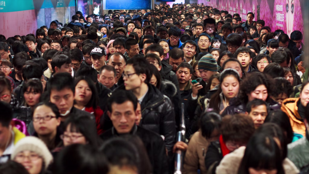 Beijing, China - February 24, 2012:After work, people are catch the subway, packed the entire aisle