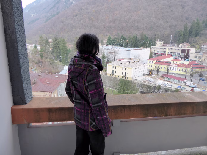 isolated-person-exploring-the-inside-of-an-hollow-abandoned-room-stockpack-istock Isolated person exploring the inside of an hollow abandoned room