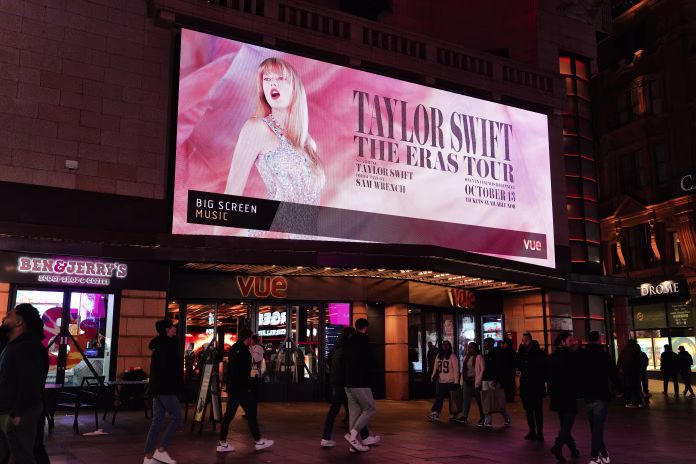 london-england-uk-october-2023-vue-cinema-london-west-end-leicester-square-is-advertising-the-cultural-phenomenon-taylor-swift-the-eras-tour-concert-musical-movie-in-central-london-uk-location-leicest-stockpack-istock London England UK - October 2023: Vue Cinema London - West End (Leicester Square) is advertising The cultural phenomenon "Taylor Swift: The Eras Tour" concert & musical movie in central London, UK. Location: Leicester Square is a pedestrianised square in the West End of London, England. Cranbourn Street, London: "Taylor Swift: The Eras Tour" Concert Movie Poster, Vue Cinema London - West End (Leicester Square) Central London, West End of London, England, United Kingdom, Britain Europe...