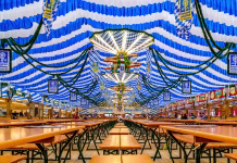 Manj piva, več težav: Oktoberfest se po jubilejnem letu sooča z izzivi Munich, Germany - April 22: typical table, benches and decoration of a beertent at the spring festival wiesn in munich on April 22, 2024