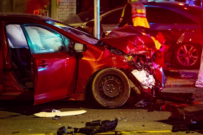 nighttime-scene-showing-a-serious-collision-between-two-cars-on-a-city-street-with-visible-damage-debris-and-emergency-atmosphere-under-streetlights-stockpack-istock Nighttime scene showing a serious collision between two cars on a city street with visible damage, debris, and emergency atmosphere under streetlights.