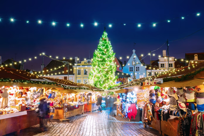 Tallinn, Estonia. Traditional Christmas Market On Town Hall Square - Raekoja Plats. Christmas Tree And Trading Houses. Happy New Year Holiday.