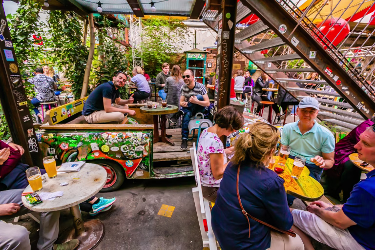 Budapest, Hungary - May 02, 2019: Interior of one of the most attractive and touristic ruin pubs, the Szimpla, at Kazinczy street. Ruin pubs, most in District VII, former Jewish quarter, are a trend of Budapest cultural and night life.