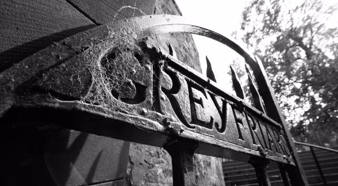 Edinburgh, Scotland - 2 September 2022: Old entry gates to cemetery Greyfriars Kirkyard
