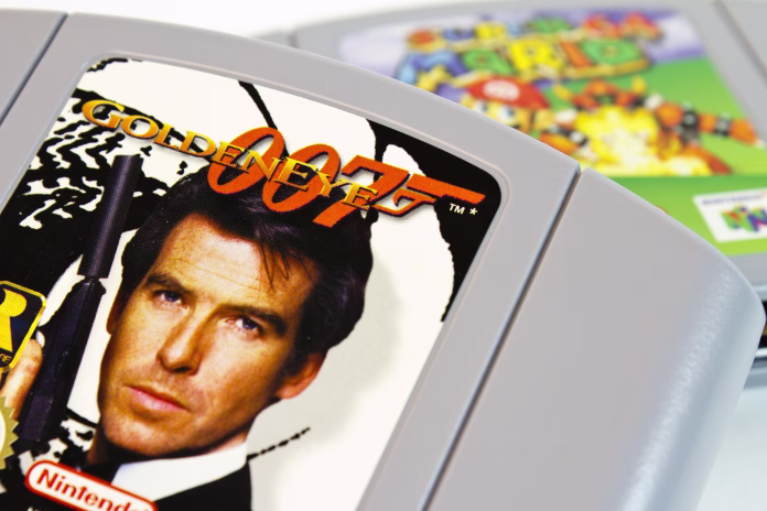 gothenburg-sweden-april-15-2011-studio-shot-of-the-very-popular-nintendo-64-game-007-goldeneye-with-super-mario-64-in-the-background-stockpack-istock "Gothenburg, Sweden - April 15, 2011: Studio shot of the very popular Nintendo 64 game 007 Goldeneye, with Super Mario 64 in the background."