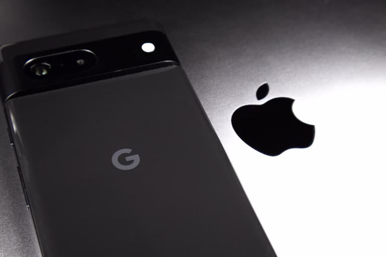 KYIV, UKRAINE - October 03, 2023 : Apple logo and Google Pixel. Two biggest american company in modern technology.