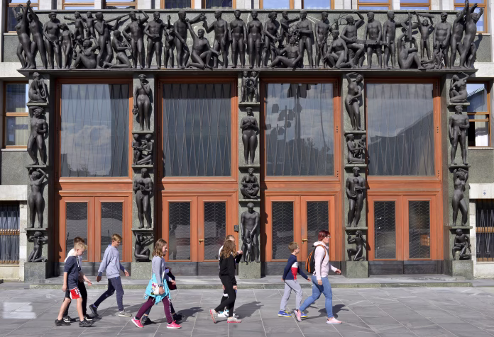 ljubljana-slovenia-october-4-2019-a-group-of-children-passes-by-the-slovenian-parliament-stockpack-istock Ljubljana, Slovenia - October 4, 2019: A group of children passes by the Slovenian Parliament.